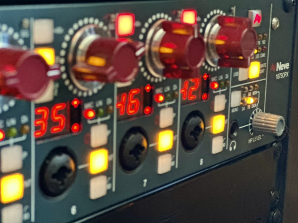 Close-up of the Neve 1073OPX preamplifier in Mirco’s studio
